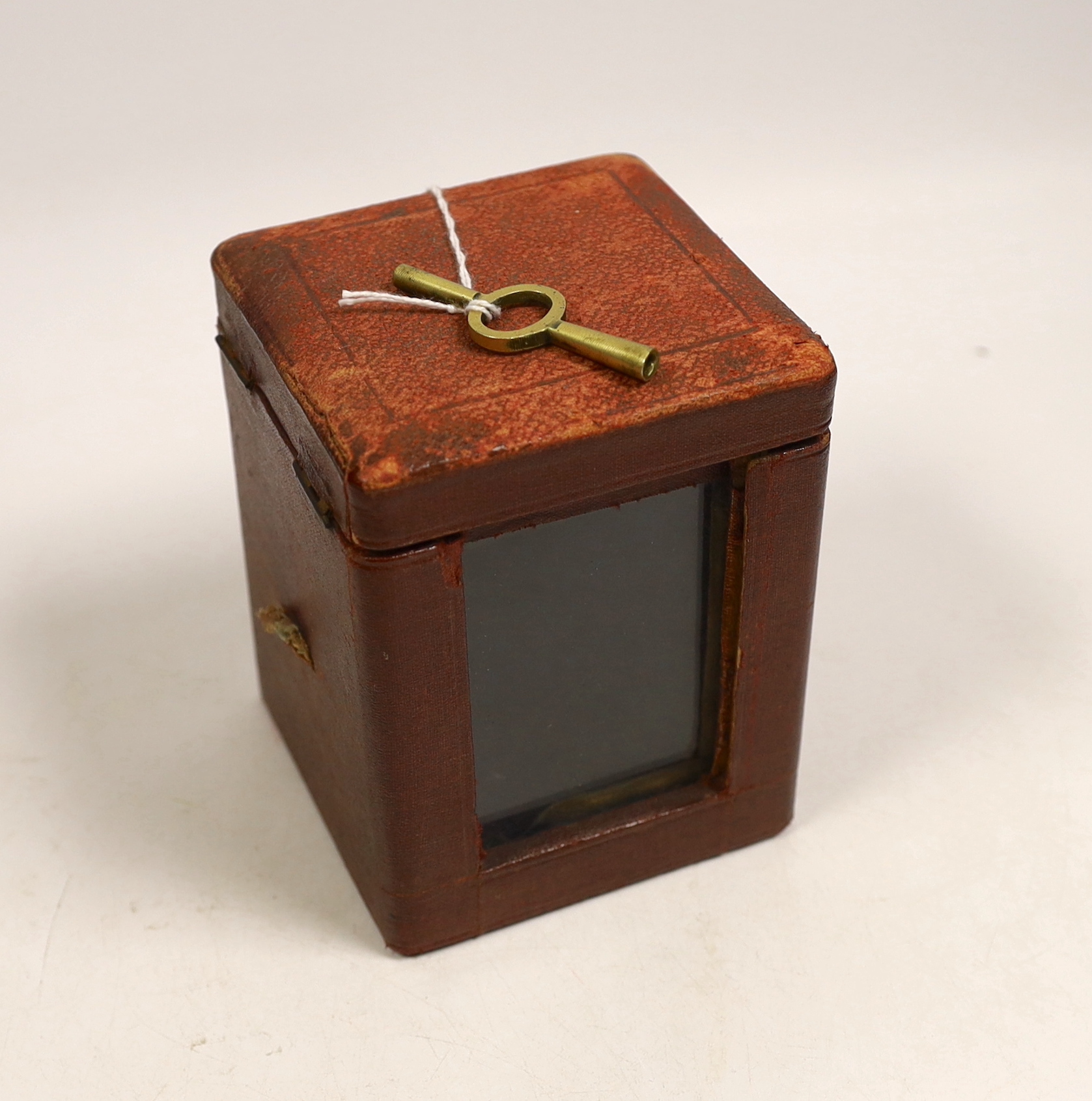 A brass carriage timepiece with travelling case, 11cm